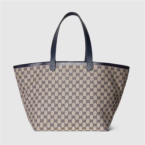 borsa gucci tessuto blu shopping|Borsa shopping Gucci Totissima misura media in tessuto GG blu .